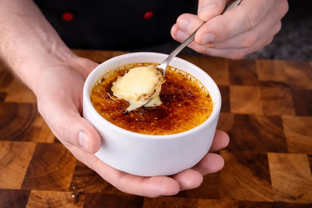 Cracking into a crème brûlée